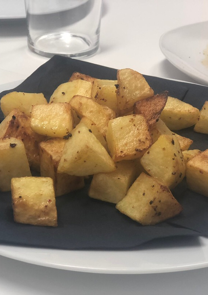Una foto de Patatas fritas con aderezo