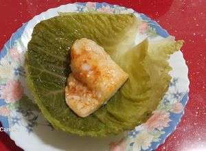 Foto principal de Bacalao asado en airfryer sobre "conchas" de col rizada