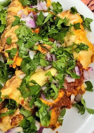 A picture of Curry chicken enchiladas (includes overnight marinading).