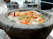 Una foto de caldo de fumet