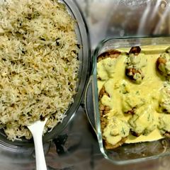 A picture of Cheese Stuffed chicken with Garlic and herb rice #wearetogether.