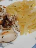 Chipirones a la plancha con cebolla pochada