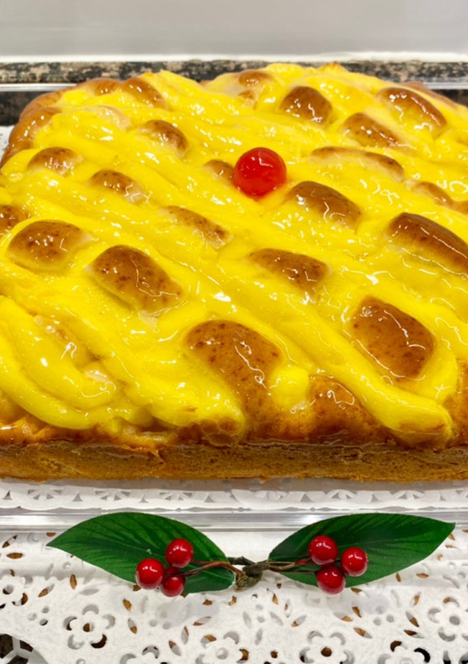 Una foto de Pastel con peras en almíbar y crema sin gluten