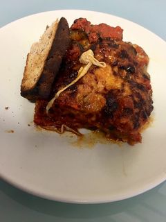 Una foto de Berenjenas a la parmesana