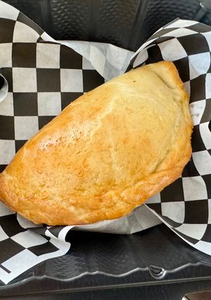 A picture of Lechon Kawali Sisig Empanada.