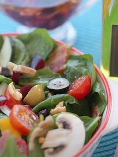 A picture of Salad with bright cherry vinaigrette.