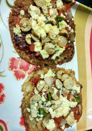 A picture of Rava Uttapam chicken pizza.