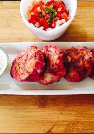 A picture of Beetroot onion patties with Peanut sauce.