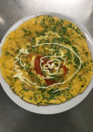 Hình của món Trứng chiên mayonaise và phô mai con bò cười.