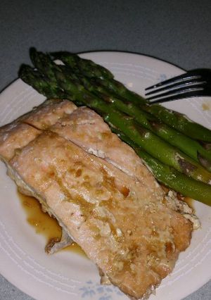 A picture of Orange Salmon with Asparagus.
