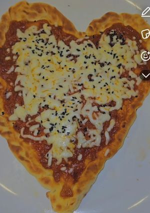 صورة لوصفة عجينة بيتزا لذيذة