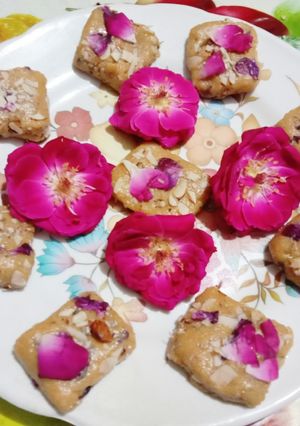 A picture of Delicious colorful tasty Gulab Pak with Alum powder.