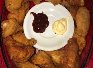 Una foto de Alitas de pollo rebozadas y fritas