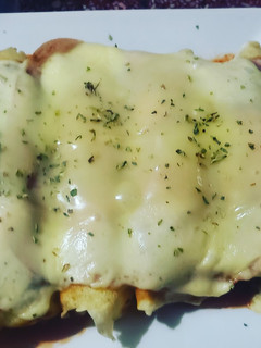 Una foto de Canelones de carne y jamón y queso