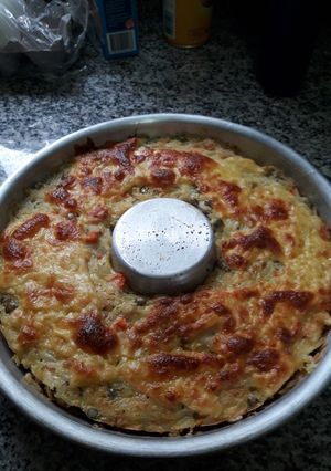 Una foto de Budín de arroz gratinado