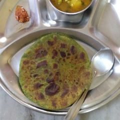 A picture of Boiled spinach and Coriander leaves paratha.