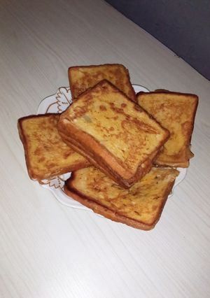 A picture of Fried bread with egg.