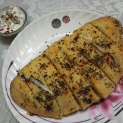 A picture of Cheese stuffed garlic bread.