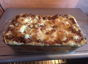 Una foto de Lasaña Mixta de carne y jamón y queso