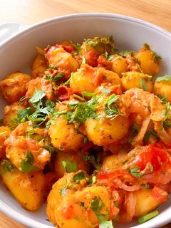 Hình của món 🌱 Khoai Tây Xào Cà Chua Masala (Vegan).