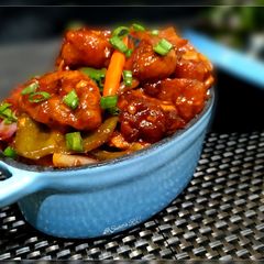 A picture of Honey Chili Garlic Mushroom with Schezwan sauce.