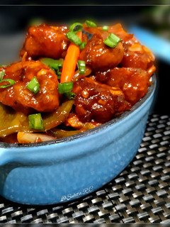A picture of Honey Chili Garlic Mushroom with Schezwan sauce.