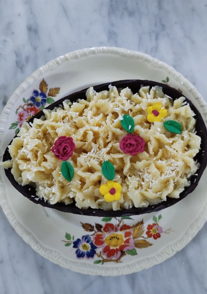 Una foto de Relleno de brigadeiro de coco para cáscara de huevo de Pascua relleno