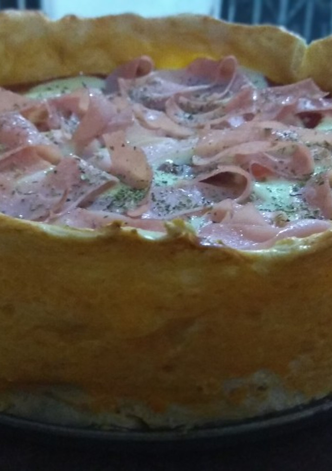 Una foto de Torta pizza rellena