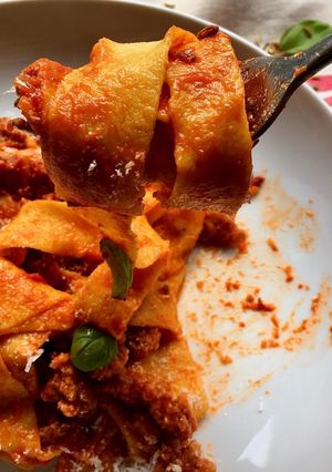A picture of Fresh pappardelle with Sausage ragu and fennel seeds.