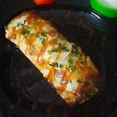 A picture of Scalloped Potato Spinach Roll.