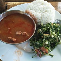 A picture of Rice stew and Greens.