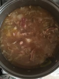 Una foto de Alubias con pie de cerdo