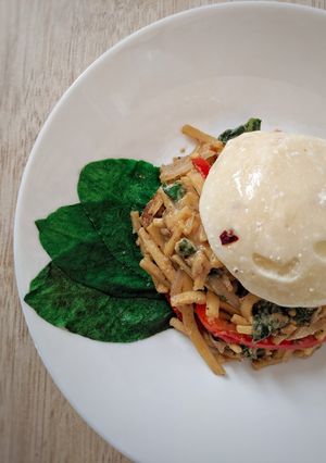 A picture of Chilli Chickpea Noodles with Peanut Sauce and Burrata Cheese.