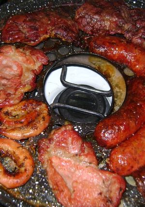 Una foto de Achuras a la parrilla circular y algo más