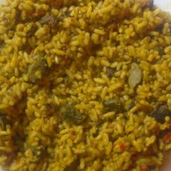 A picture of Okpehe rice and liver.
