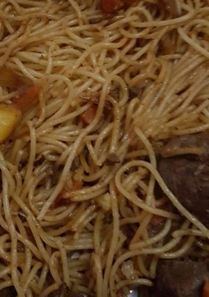 A picture of Beef liver with Spaghetti. (Pasta).