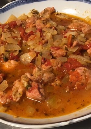 Une photo de Araignée de porc marinée thym,citron et poivre vert frais & sautée tomates et oignon