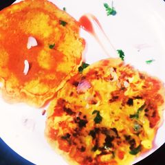 A picture of Schezwan Besan Uttapam.