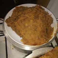 A picture of Mashed sweet potato and beans.