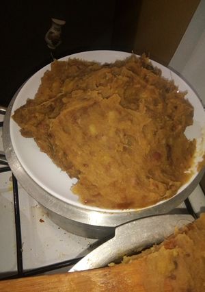 A picture of Mashed sweet potato and beans.