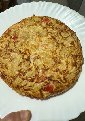Una foto de Tortilla de papas con algún tip