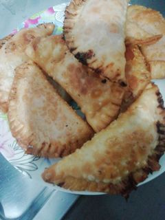 Una foto de Empanadilla de atún, huevo y cebolla
