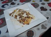Una foto de canelones crema choclo