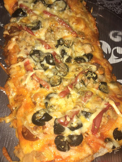 Una foto de Pizza (masa e ingredientes caseros)