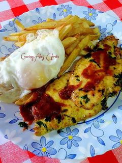 Una foto de Filetes de pechuga de pollo medianos en especial, ajo y perejil