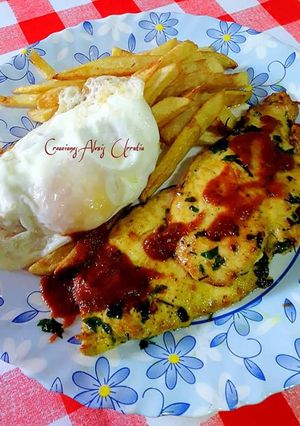Una foto de Filetes de pechuga de pollo medianos en especial, ajo y perejil