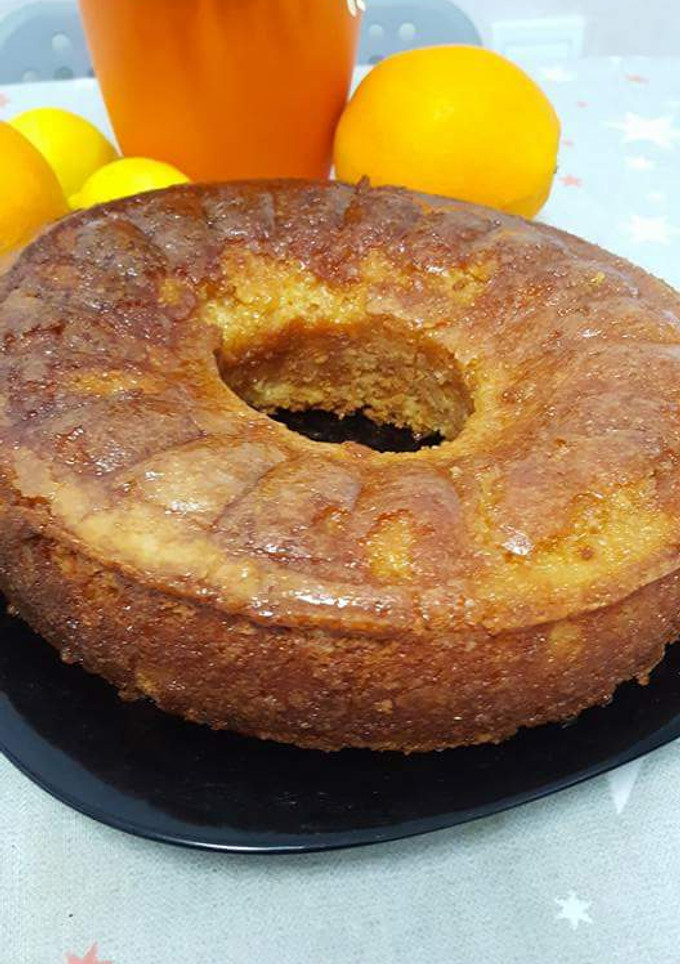 Una foto de Bizcocho de claras con almíbar de cítricos