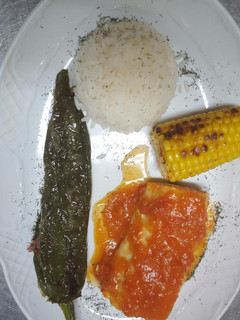 Una foto de Bacalao con tomate