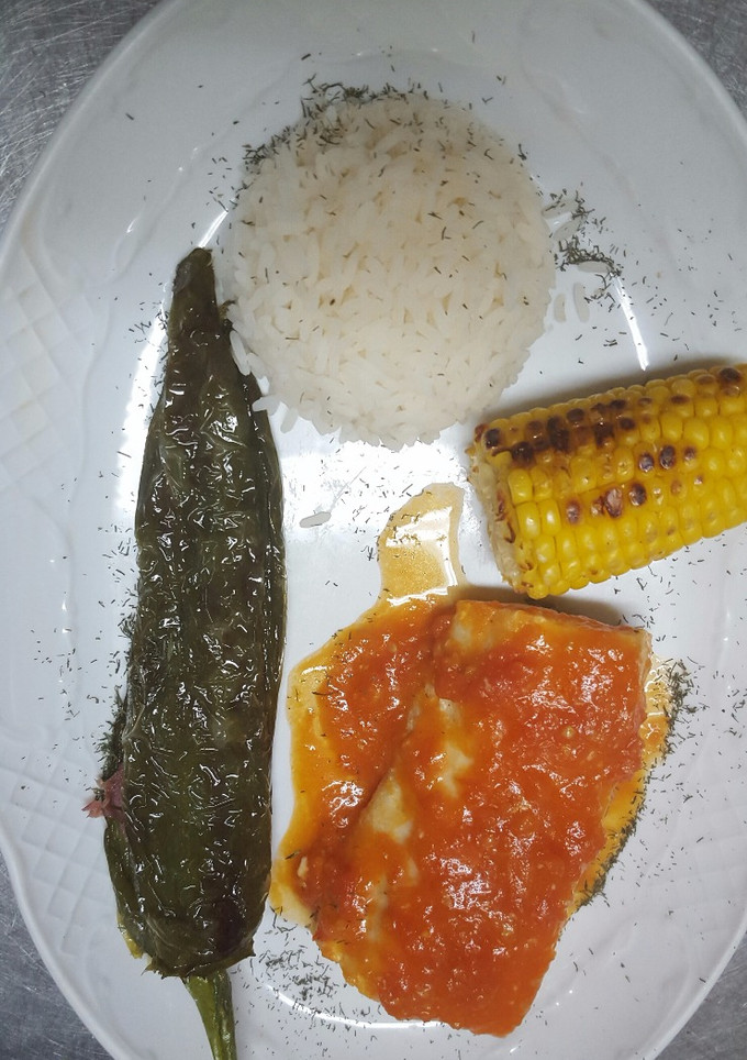 Una foto de Bacalao con tomate