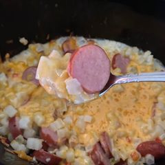 A picture of Slow Cooker Cheesy Kielbasa Hashbrown Casserole.